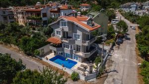 an aerial view of a house with a swimming pool at Villa Necati Bey in Marmaris