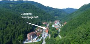 an aerial view of a village in the mountains at Smeštaj Gligorijević in Lukovo