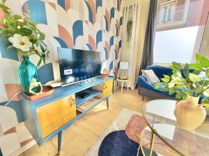 Μια τηλεόραση ή/και κέντρο ψυχαγωγίας στο T2 Cosy Centre Ville Amiens - Rez-de-chaussée