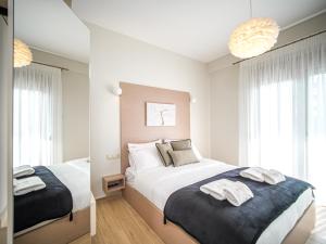 Postel nebo postele na pokoji v ubytování Divino Inn