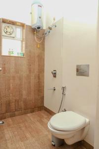 Ένα μπάνιο στο Tranquil 2BHK Serviced Apartment in Siolim