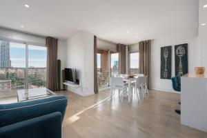 A seating area at Enjoybcn Marina Apartment