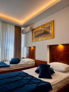 Letto o letti in una camera di Hotel Exclusive