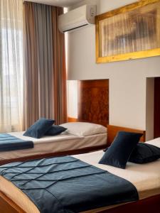 Letto o letti in una camera di Hotel Exclusive