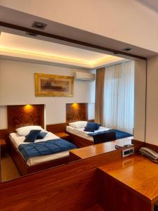 Letto o letti in una camera di Hotel Exclusive