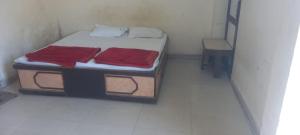 Letto o letti in una camera di Hotel Sangam sagar