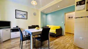 Kuchyň nebo kuchyňský kout v ubytování Apartments - Villa Sidro