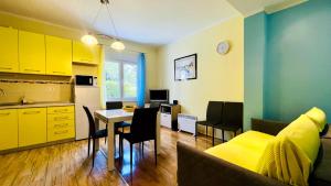Kuchyň nebo kuchyňský kout v ubytování Apartments - Villa Sidro