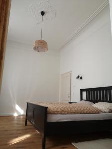 Postel nebo postele na pokoji v ubytování Kleinstadtidyll