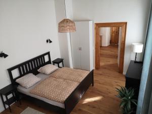 Postel nebo postele na pokoji v ubytování Kleinstadtidyll