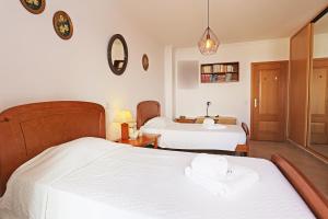 Postel nebo postele na pokoji v ubytování Lancemar Flat in Albufeira + 18 fotografií