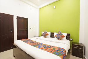 Posteľ alebo postele v izbe v ubytovaní Royal Awadh Hotel + 24 fotografií
