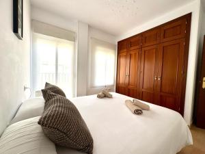 Posteľ alebo postele v izbe v ubytovaní Mirador de Doñana Nº 14, Apartamentos Living Sur