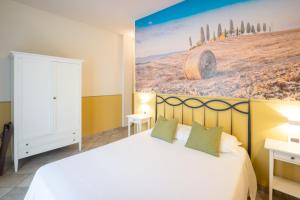 Voodi või voodid majutusasutuse Hotel Le Colline toas