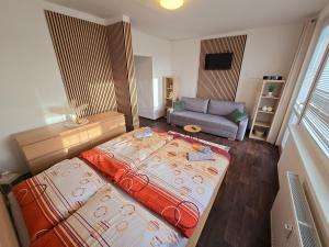 Postel nebo postele na pokoji v ubytování Klatovy Apartment