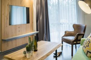 TV a/nebo společenská místnost v ubytování Hagoshrim Hotel & Nature