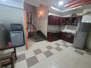 Η κουζίνα ή μικρή κουζίνα στο Vinh Phong APT # 2
