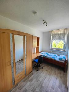 Postel nebo postele na pokoji v ubytování Schöne Unterkunft für Reisende & Berufstätige