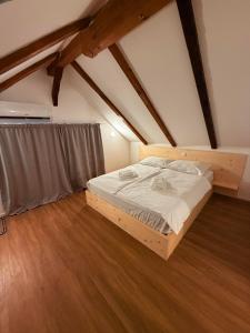 Postel nebo postele na pokoji v ubytování Chalet PJagodic