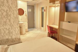 Postel nebo postele na pokoji v ubytování Hello Hotels Bucuresti Gara de Nord