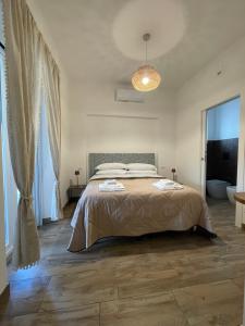 Postel nebo postele na pokoji v ubytování 2Effe Circeo B&B