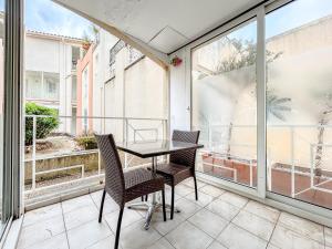 Un balcon sau o terasă la Lumineux F2 avec terrasse & piscine, Fréjus-Port
