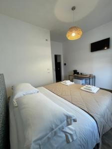 Postel nebo postele na pokoji v ubytování 2Effe Circeo B&B