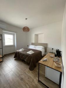Postel nebo postele na pokoji v ubytování 2Effe Circeo B&B