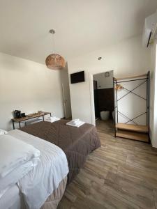 Postel nebo postele na pokoji v ubytování 2Effe Circeo B&B