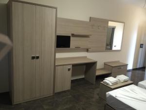 Postel nebo postele na pokoji v ubytování Herges Hotel