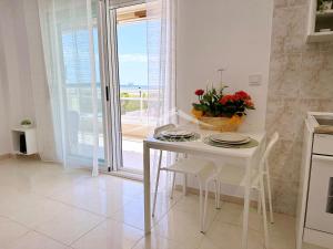 Kuchyň nebo kuchyňský kout v ubytování AT-Pineda-03