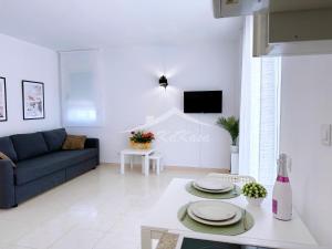 TV a/nebo společenská místnost v ubytování AT-Pineda-03