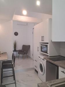 Η κουζίνα ή μικρή κουζίνα στο Funky, cute flat close t center