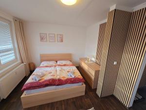 Postel nebo postele na pokoji v ubytování Klatovy Apartment