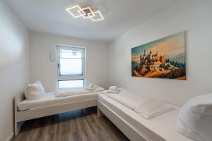 Postel nebo postele na pokoji v ubytování BPS Apartment #1 Business - NEU - Deluxe - Modern