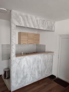 Kuchyň nebo kuchyňský kout v ubytování Apartmani Centar