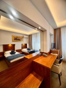 Letto o letti in una camera di Hotel Exclusive