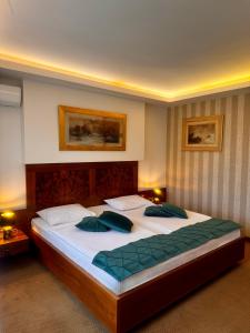 Postel nebo postele na pokoji v ubytování Hotel Exclusive