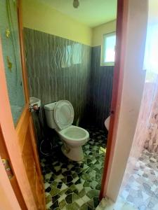 Ένα μπάνιο στο Janet Apartment & Transient House