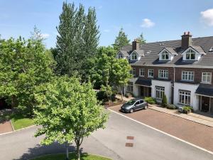 an aerial view of a house with a car parked in the driveway at 133 - Large Duplex House by Shortstays in Galway