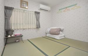 Postel nebo postele na pokoji v ubytování BJ family inn