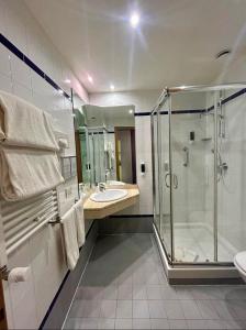 Kúpeľňa v ubytovaní GP Hotel