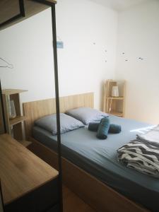 Un ou plusieurs lits dans un hébergement de l'établissement Appartement 4 personnes à louer