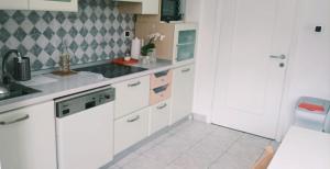 Kuchyň nebo kuchyňský kout v ubytování Residenza Chiara