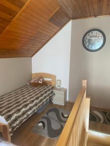 Postel nebo postele na pokoji v ubytování Gréta apartman
