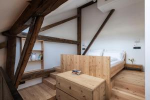 Postel nebo postele na pokoji v ubytování Ansitz Thierburg Suites