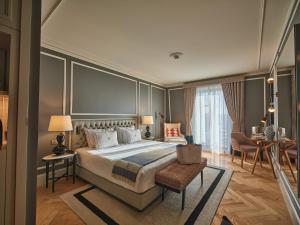 Postel nebo postele na pokoji v ubytování GA Palace Hotel & Spa, a XIXth-Century Villa + 37 fotografií