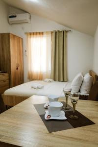 Postel nebo postele na pokoji v ubytování Apartments Djukic