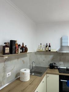 Kuchyň nebo kuchyňský kout v ubytování Enma Rooms