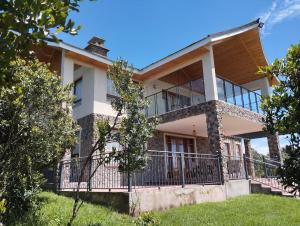 an image of a house with a balcony at Sangare Hills Country Homes & Resort in Mweiga